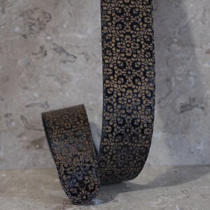 Black Patent with Floral Etching over Black Leather Guitar Strap