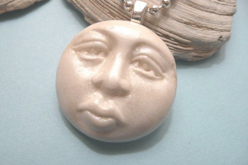 Molded 3-D moon face, handmade polymer clay