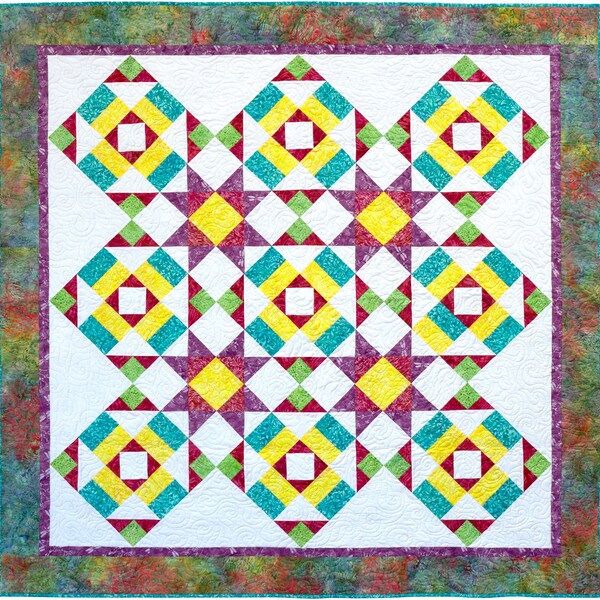 Showy Stars pdf quilt pattern to make a lap size quilt in bright colors.