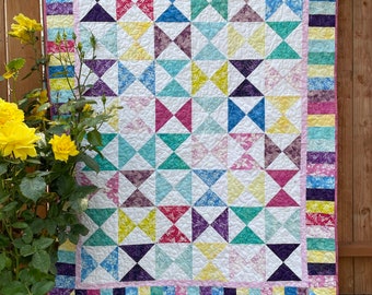 Scrappy Quilt PDF Pattern in lap or twin size, Keeping Time featuring Hourglass blocks and Piano Key Border