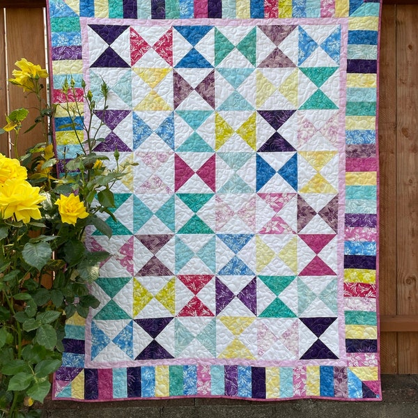 Scrappy Quilt Pattern in lap or twin size, Keeping Time featuring Hourglass blocks and Piano Key Border