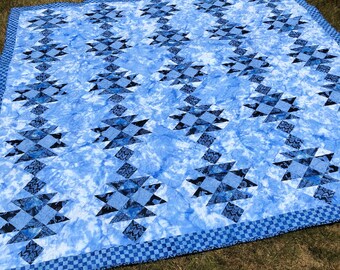 Hovering Hawks Large Lap Quilt PDF Pattern, Azure Sea featuring Prairie Skies fabrics by Island Batik, finishes at 75 x 75 inches