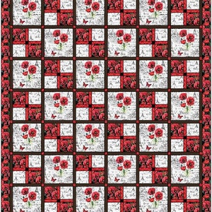 May include: A red, white, and black quilt with a repeating pattern of red poppies and a white background with a black and white pattern. The quilt is framed with a black border.