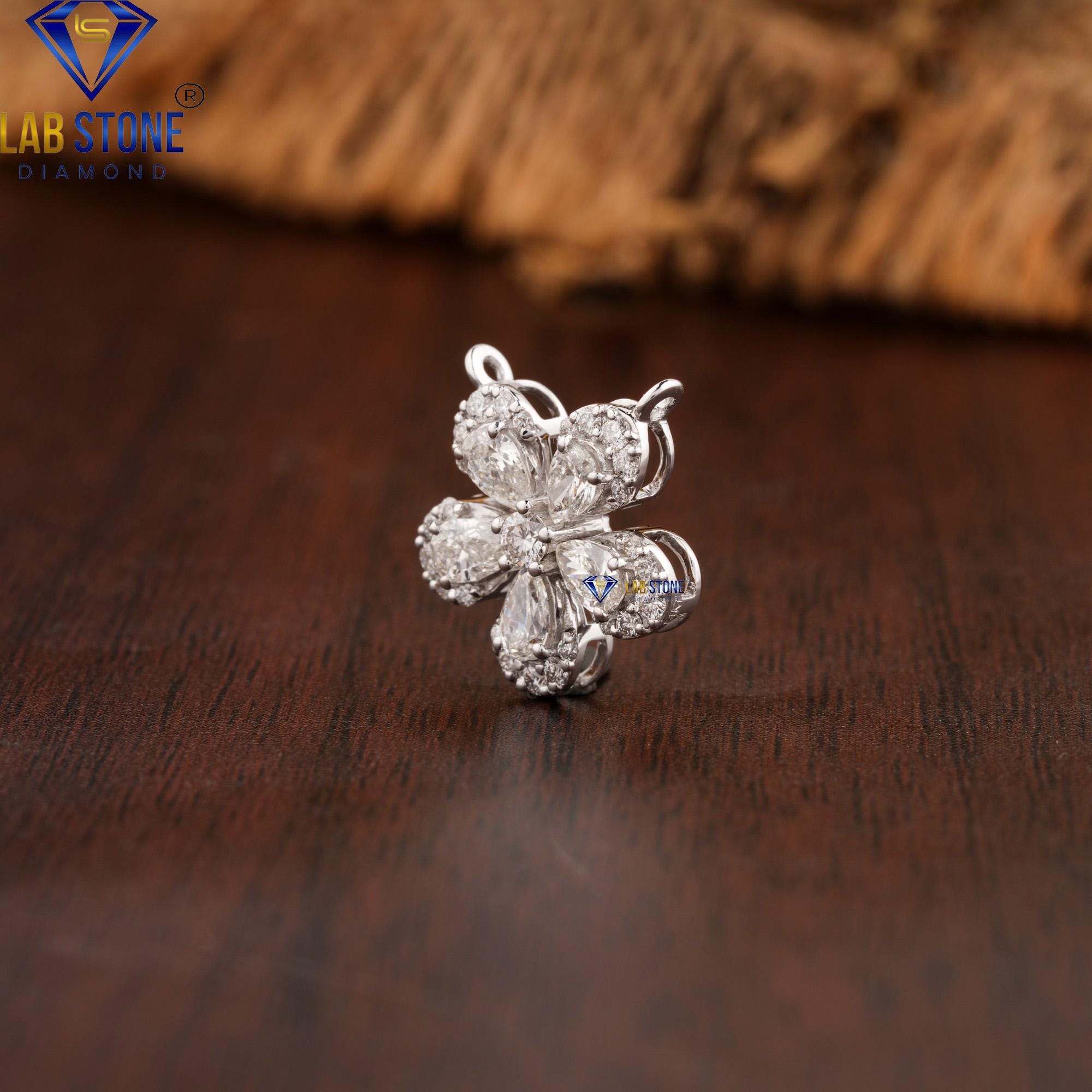 0.70 TDW Round & Pear Cut Diamond White Gold Pendant