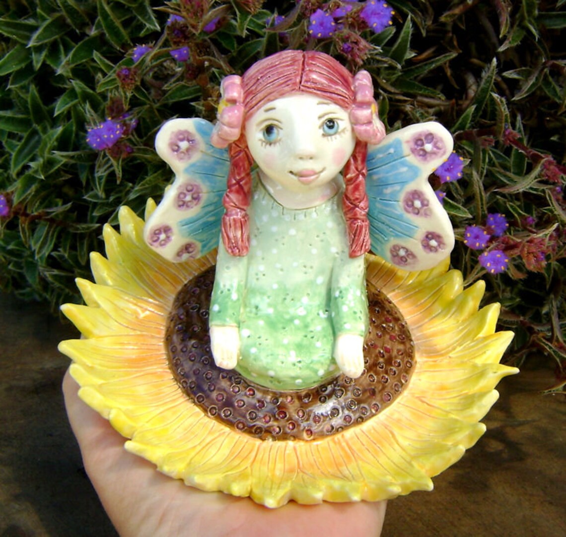 Ceramic Fairy Figurine sitting in a Sunflower Meditation Etsy