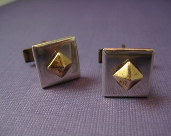 Square sterling silver cufflinks with brass pyramids