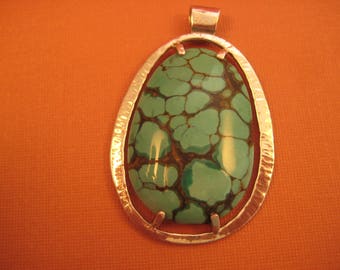 Hammered sterling  silver and turquoise pendant on chain