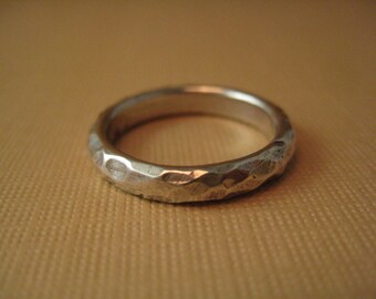 Chiseled stone texture  Wedding band  size 6.75  Solid sterling silver  hammered pattern ring