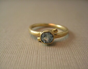 18kt yellow gold Blue Topaz and Diamond hammered ring size 5.75