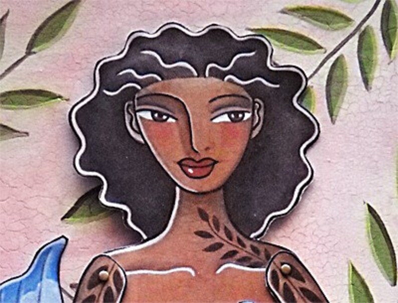 May include: A woman with dark brown hair and a leaf tattoo on her shoulder. She has brown skin and is wearing a light pink background.