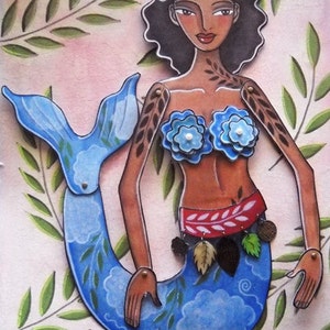 May include: A blue mermaid with a brown body and black hair. She is wearing a blue flower bra and a red and white belt with green leaves. The mermaid is on a white background with green leaves.