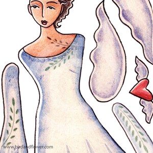 May include: A paper doll of a woman with long brown hair wearing a blue dress with green leaves. The doll is cut out and ready to be played with. The doll is part of a set of paper dolls.