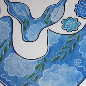 May include: Blue and white ceramic tile with a whimsical design featuring a stylized fish with green leaves and white clouds. The tile has a textured surface and a black outline.