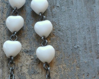 white hot hearts earrings. matte czech glass on oxidized sterling silver by val b.