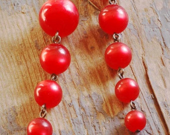 simply red. pearly round vibrant red vintage lucite  beads tapered on hand-oxidized genuine sterling silver by val b.