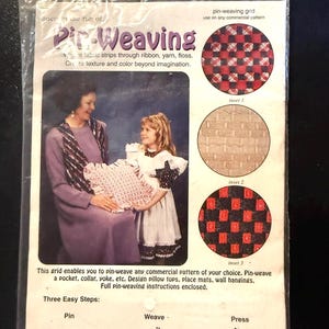 May include: Pin-Weaving kit with a woman and child holding a pillow. The package includes instructions and examples of woven patterns. The text reads "Pin-Weaving" and describes the use of fabric strips, ribbon, yarn, and floss.