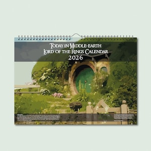 May include: A 2026 calendar featuring a scene from the Lord of the Rings, with the text "Today in Middle-Earth" and a depiction of a hobbit hole with a green door. The calendar is spiral-bound and hangs from a metal loop.