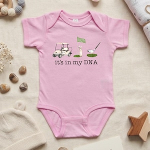 May include: A set of three ceramic mugs with a speckled, matte finish. The mugs are in shades of cream, light gray, and dark gray. Each mug has a simple, modern design and a rounded handle. The mugs are stacked on top of each other.