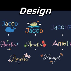 May include: Eight different designs for personalized names, including Jacob and Amelia. The designs feature a whale, a boat, an airplane, stars, strawberries, flowers, and croissants.