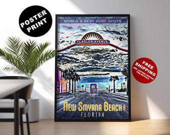 May include: A framed poster print featuring a stylized illustration of New Smyrna Beach, Florida. The artwork includes the text "World's Best Surf Spots" and "Flagler Avenue." The poster has a black frame and is displayed on a wooden floor.