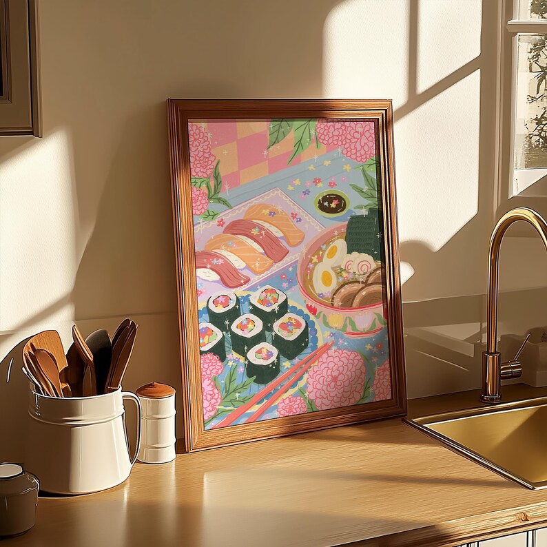 May include: A framed illustration of a colorful Japanese meal with sushi, ramen, and flowers. The illustration is in a pastel color palette with pink, blue, and yellow accents.