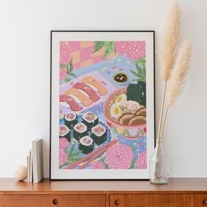 May include: A colorful illustration of a Japanese meal with sushi, ramen, and chopsticks. The food is set on a blue and pink table with flowers and glitter.
