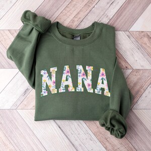 Custom Nana Sweatshirt Nana Floral Sweatshirt Personalized Nana Crewneck Pullover Christmas Gift For Mom Gifts Hoodies Custom Clothing.