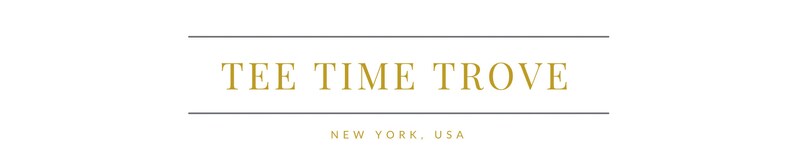 May include: Gold text on a white background reads "TEE TIME TROVE" with the words "NEW YORK, USA" below.