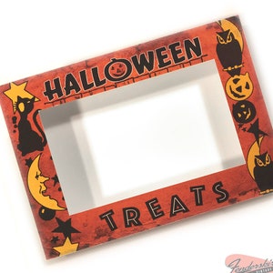 May include: Orange and black Halloween-themed photo frame with the words "Halloween Treats" and various Halloween icons including a black cat, an owl, a crescent moon, and pumpkins.
