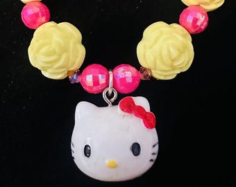 Unique Adorable One of a Kind Stretchy Hello Kitty Bracelet. Vibrant Yellow and Pink.