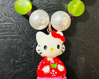 Unique Adorable One Of A Kind Stretchy Hello Kitty Bracelet Vibrant Green, Pearl, and Pink