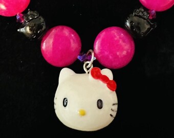 One of a kind stretchy hello kitty bracelet vibrant purple, white, and fusia