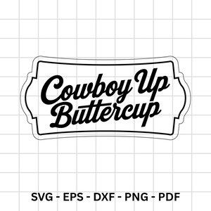 May include: A black and white graphic design featuring the phrase "Cowboy Up Buttercup" in a stylized font within a decorative frame. Below the frame are the file type abbreviations: SVG, EPS, DXF, PNG, and PDF.