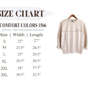 May include: A cream-colored Comfort Colors 1566 heavyweight sweatshirt displayed on a hanger. The image includes a size chart with measurements in inches for width and length, ranging from S to 3XL. The text "SIZE CHART" is at the top.