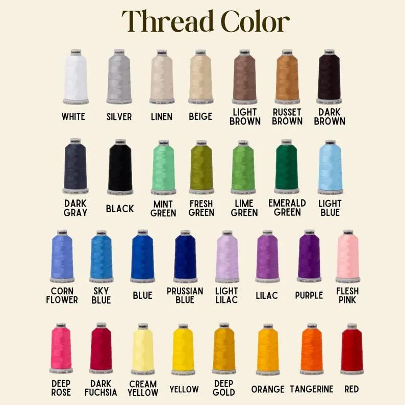 May include: A colour chart titled "Thread Colour" displays a variety of thread spools in various colours. The colours include white, silver, beige, brown, black, green, blue, purple, pink, yellow, orange, and red. Each spool is labelled with its corresponding colour name.