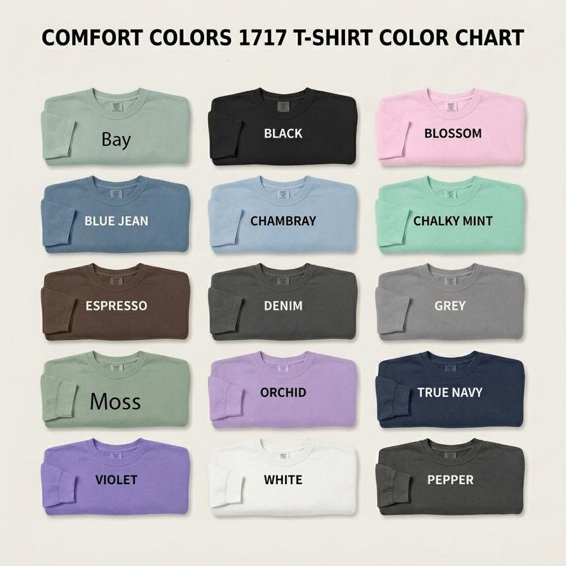 Peut inclure: Un nuancier de t-shirts Comfort Colors 1717 pr&eacute;sentant quinze t-shirts pli&eacute;s dans diverses teintes, notamment bay, black, blossom, blue jean, chambray, chalky mint, espresso, denim, grey, moss, orchid, true navy, violet, white et pepper.