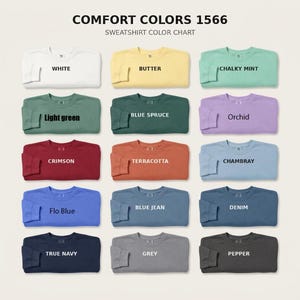 Peut inclure: Un nuancier de sweat-shirts Comfort Colors 1566 pr&eacute;sentant quinze sweat-shirts &agrave; col rond pli&eacute;s dans diverses couleurs &eacute;tiquet&eacute;es White, Butter, Chalky Mint, Light Green, Blue Spruce, Orchid, Crimson, Terracotta, Chambray, Flo Blue, Blue Jean, Denim, True Navy, Grey et Pepper.