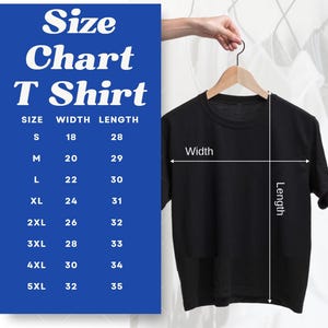 May include: A black T-shirt hanging on a wooden hanger. A size chart with measurements in inches is displayed on a blue background. The chart lists sizes S to 5XL with corresponding width and length measurements.