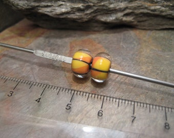Encased rondelle (a bead pair) lampwork glass beads by Beth Mellor, Beeboo