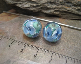 Encased floral rounds (a bead pair) lampwork glass beads by Beth Mellor, Beeboo