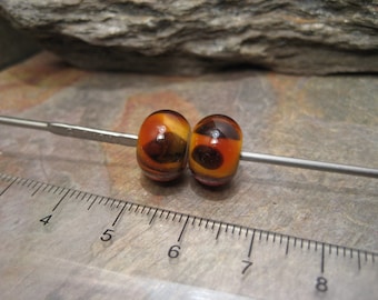 Encased rondelle (a bead pair) lampwork glass beads by Beth Mellor, Beeboo