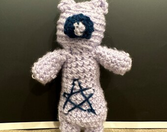 The turquoise and violet crocheted star bear
