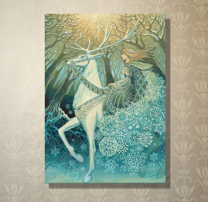 The Snow Queen ~ 5x7 blank greeting card of the original painting by Emily Balivet. The artwork depicts the mythic fairytale goddess riding a mystical white stag through an enchanted, winter woodland forest. Surrounded by intricate snowflakes and icy tones. The ethereal scene captures magic, fantasy, and Norse mythology. Perfect for fairy tale, fantasy, and winter solstice decor enthusiasts. Ideal for lovers of Art Nouveau women, Yule wall art, and fans of magical realism and bohemian decor.