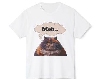 May include: White t-shirt featuring a cartoon image of a cat with a thought bubble above its head that says "Meh..."