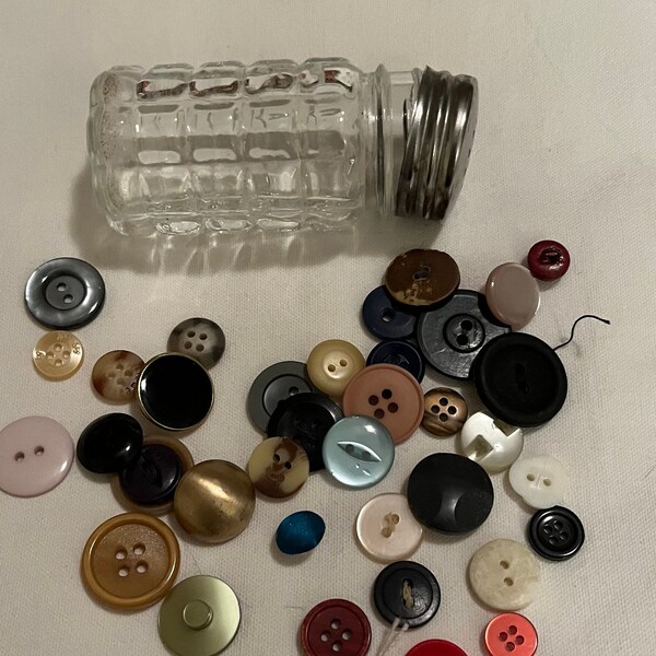 Vintage Clear Glass Shaker with 35 Buttons, 2-hole, 4-hole, & shank buttons for sewing crafts, textured glass jar with metal lid