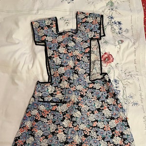 Vintage Full Bib Apron * Black with Blue Pink Flowers, 1 pocket, connected at back / over the neck, long ties, black bias tape trim