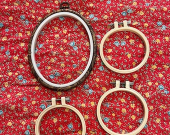 4 Embroidery Hoops / Frames, plastic, 1 brown oval 6 X 7-1/4", 3 beige round 4" diameter, plastic with metal screws, hanger