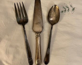 3 Vintage Serving Pieces:  1 Holmes & Edwards serving fork, 1 cake server, 1 1847 Rogers Bros. spoon, tarnished but may be polished