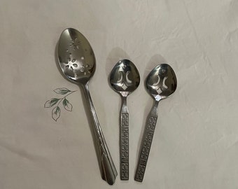 3 Vintage Serving Pieces:  Slotted Spoons, 1 unmarked with flower motif, 2 matching marked Rogers Insilco