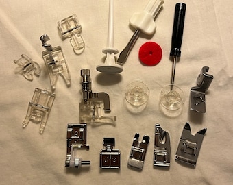 11 Sewing machine feet and more, tools for sewing, bobbins, screwdrivers, metal and plastic